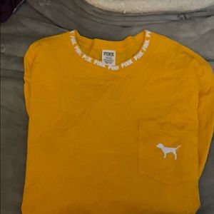 Pink long sleeved yellow T-shirt